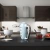 186467 1 smeg rucni mixer pastelova modra scena 01