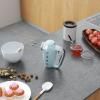 186467 3 smeg rucni mixer pastelova modra scena 03