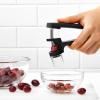 Dénoyauteur de cerises et d'olives GOOD GRIPS 14 cm, noir, plastique, OXO